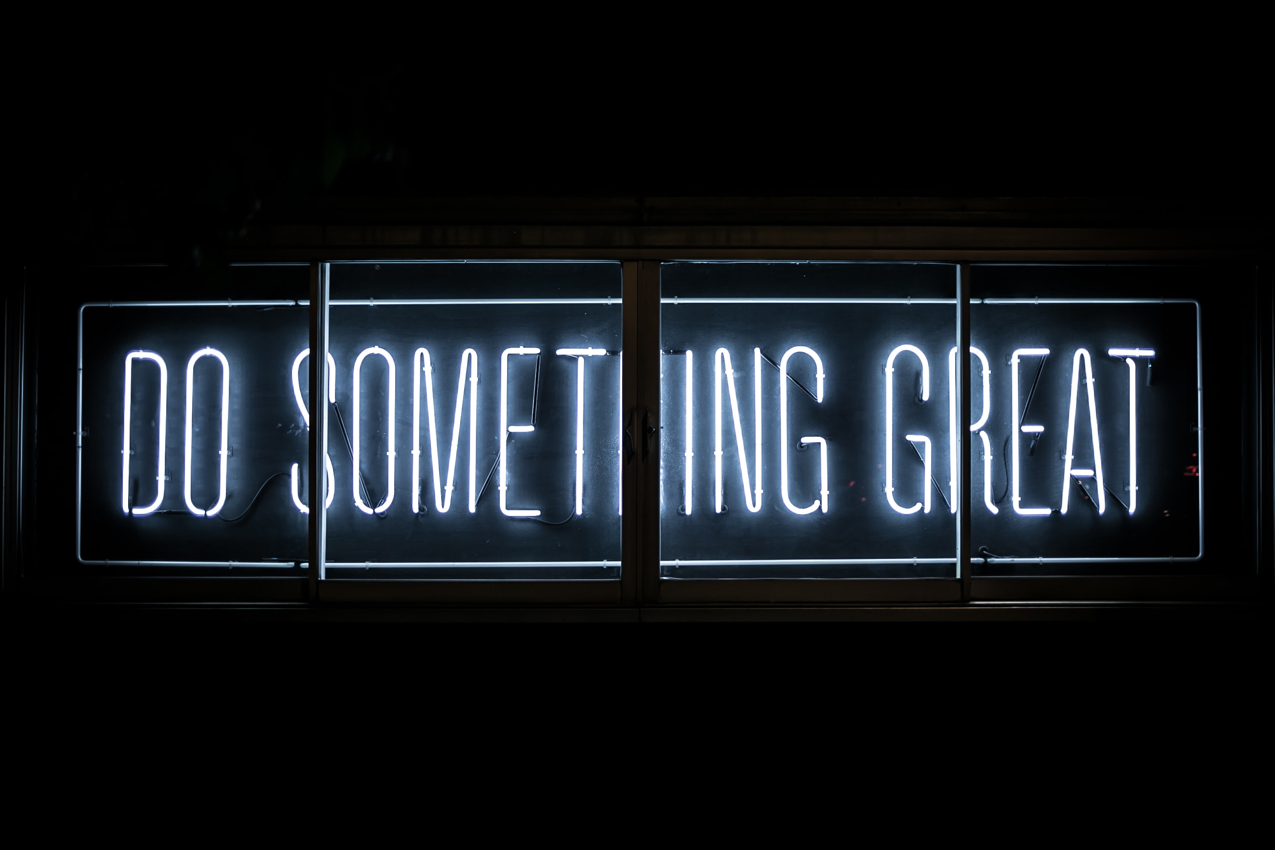 Neon sign that says Do something great